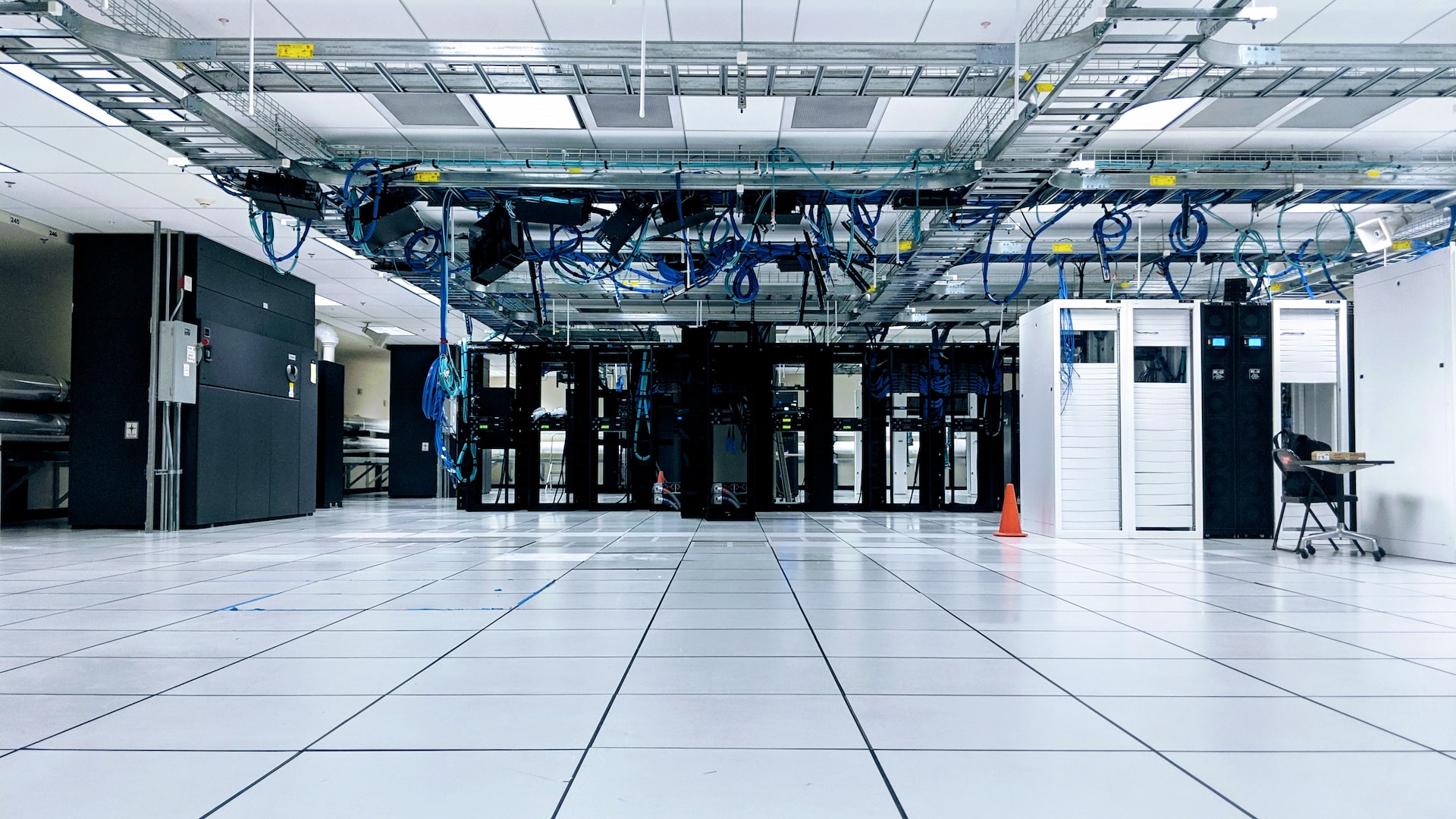 A large data center with a lot of wires and cables, offering shared hosting for websites or VDS/VPS solutions.