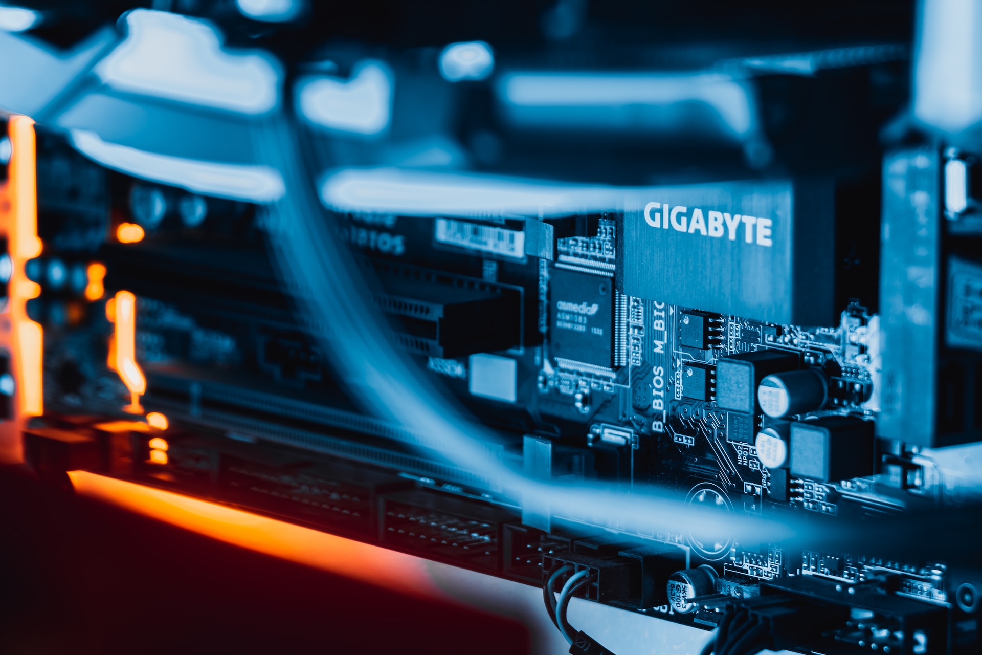 A close up image of a computer motherboard showcasing virtualization technologies.