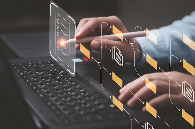Man working on laptop and touching virtual screen