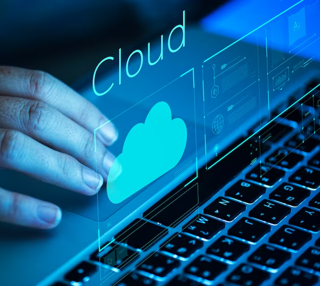 Fingers on the keyboard, in the foreground a window with the inscription Cloud