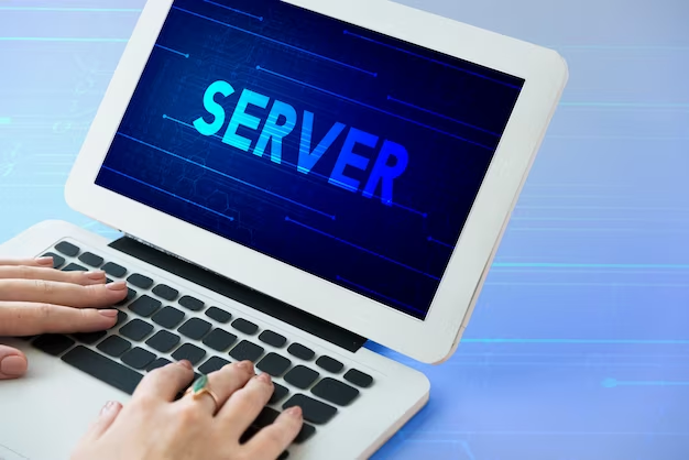 Hands lie on a laptop with the inscription server on it